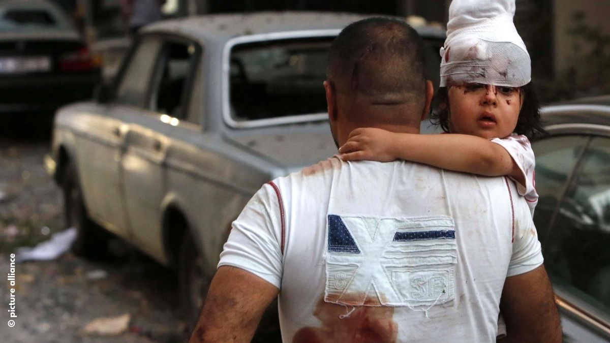 Beirut-Libanon: Mann mit Kind auf dem Arm